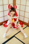 blouse cosplay detached_sleeves hairbow hakurei_reimu higurashi_rin miko skirt touhou rating:Safe score:2 user:Beako
