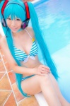 aqua_hair bikini cleavage cosplay hatsune_miku headset mashiro_yuki pool project_diva swimsuit twintails vocaloid wet rating:Safe score:1 user:nil!