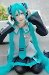 aqua_hair ayame blouse cosplay default_costume detached_sleeves hatsune_miku headset pleated_skirt skirt thighhighs tie twintails vocaloid zettai_ryouiki rating:Safe score:1 user:nil!