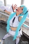 aqua_hair cosplay detached_sleeves hair_ribbons hatsune_miku microphone miniskirt nei project_diva skirt thighhighs twintails vocaloid zettai_ryouiki rating:Safe score:0 user:pixymisa