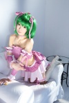 ahoge armband boots cosplay detached_sleeves green_hair hair_ribbons macross macross_frontier mashiro_yuki microphone miniskirt ranka_lee skirt tubetop twintails rating:Safe score:5 user:nil!