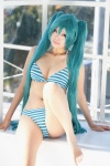 aqua_hair bikini cleavage cosplay hatsune_miku neko swimsuit tagme_song twintails vocaloid rating:Safe score:7 user:nil!