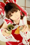 blouse cosplay detached_sleeves hairbow hakurei_reimu higurashi_rin miko skirt touhou rating:Safe score:1 user:Beako