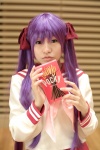 cosplay hair_ribbons hiiragi_kagami lucky_star naito pocky purple_hair sailor_uniform school_uniform socks twintails rating:Safe score:0 user:darkgray