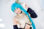 aqua_hair cosplay croptop detached_sleeves hairbow hatsune_miku mashiro_yuki pleated_skirt ponytail project_diva skirt vocaloid rating:Safe score:0 user:nil!