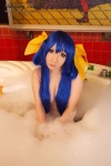 bathroom bathtub blue_hair cleavage cosplay dizzy guilty_gear hairbows hitori_gokko saku soap_suds tail wet rating:Safe score:1 user:nil!