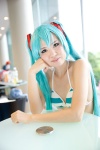 aqua_hair bikini cosplay hatsune_miku headset kishimen project_diva swimsuit twintails vocaloid rating:Safe score:0 user:pixymisa