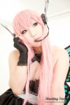 cleavage cosplay dress fingerless_gloves gloves headset megurine_luka pink_hair saku twintails vocaloid wings rating:Safe score:2 user:nil!