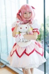 bows choker cosplay dress gloves hairbow kaname_madoka kujyou_konegi petticoat pink_hair plushie puella_magi_madoka_magica red_eyes tiered_skirt twintails rating:Safe score:0 user:pixymisa