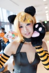 animal_ears blonde_hair cat_ears cat_paws cosplay detached_sleeves hair_clips halter_top kagamine_rin paw_gloves striped tomoshibi vocaloid rating:Safe score:0 user:pixymisa