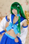 bed cleavage cosplay croptop detached_sleeves green_hair kochiya_sanae lenfried miniskirt skirt touhou rating:Safe score:0 user:nil!