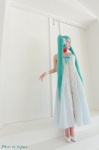 aqua_hair collar cosplay dress hairbow hatsune_miku koyuki tagme_song twintails vocaloid rating:Safe score:2 user:lolzin
