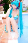 aqua_hair bikini cleavage cosplay hatsune_miku headset mashiro_yuki pool project_diva swimsuit twintails vocaloid rating:Safe score:0 user:nil!