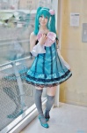 aqua_hair colorful_x_melody_(vocaloid) cosplay detached_sleeves dress hatsune_miku kei project_diva thighhighs twintails vocaloid zettai_ryouiki rating:Safe score:1 user:nil!