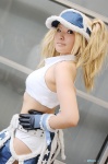 blonde_hair blue_mary chaps cosplay gloves halter_top king_of_fighters midriff nogu pantyhose twintails rating:Safe score:1 user:nil!