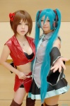 akatsuki_ayumu cosplay default_costume hatsune_miku headset meiko miniskirt nagisa_kouki skirt twintails vocaloid rating:Safe score:0 user:Log