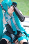 aqua_hair ayaki blouse cosplay detached_sleeves hatsune_miku headset pleated_skirt skirt thighhighs tie twintails vocaloid zettai_ryouiki rating:Safe score:1 user:nil!