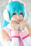 aqua_hair blouse blue_eyes cosplay detached_sleeves ear_muffs hatsune_miku moka_aoi project_diva project_diva_2nd scarf twintails vocaloid rating:Safe score:0 user:pixymisa