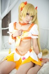 blonde_hair choker cosplay croptop cure_sunshine hairbows heartcatch_precure! kanda_midori miniskirt myoudouin_itsuki pretty_cure skirt twintails underboob rating:Safe score:14 user:xkaras