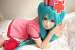 aqua_hair bed choker cosplay hatsune_miku momo_hana nurse nurse_cap nurse_uniform pantyhose thighhighs twintails vocaloid zettai_ryouiki rating:Safe score:2 user:pixymisa