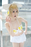 bikini blonde_hair cleavage cosplay hairbow hair_clips headset kagamine_rin microskirt pantyhose project_diva skirt swimsuit vocaloid yuyu_kaname rating:Safe score:1 user:nil!