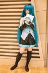 aqua_hair cosplay default_costume detached_sleeves hatsune_miku headset hina pleated_skirt skirt thighhighs tie twintails vocaloid zettai_ryouiki rating:Safe score:0 user:nil!