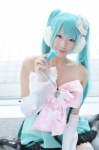 aqua_hair cosplay detached_sleeves dress hatsune_miku kneehighs microphone tagme_song twintails uni vocaloid rating:Safe score:1 user:nil!
