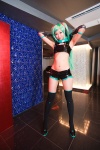 aqua_hair black_legwear cosplay croptop detached_sleeves elbow_gloves gloves hatsune_miku headset necoco necosmo project_diva shorts thighhighs twintails vocaloid rating:Safe score:2 user:nil!