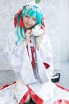aqua_eyes cosplay hatsune_miku hood maitako multi-colored_hair plushie robe tassels vocaloid rating:Safe score:1 user:pixymisa