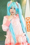 aqua_eyes aqua_hair cosplay dress hatsune_miku tiered_skirt toko_(ii) twintails vocaloid rating:Safe score:1 user:pixymisa