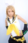 blonde_hair cosplay default_costume detached_sleeves hairbow hair_clips headset hiromichi kagamine_rin sailor_uniform school_uniform shorts vocaloid rating:Safe score:0 user:nil!