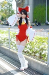 boots cosplay detached_sleeves hairbow hakurei_reimu kneepads miko one-piece_swimsuit pantyhose swimsuit thighhighs touhou tsukushi rating:Safe score:7 user:nil!