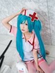 aqua_hair chii cosplay hatsune_miku koiiro_byoutou_(vocaloid) nurse nurse_cap nurse_uniform thighhighs twintails vocaloid zettai_ryouiki rating:Safe score:1 user:xkaras