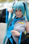 aqua_hair blouse cosplay detached_sleeves hatsune_miku headset pleated_skirt sanaka skirt tie twintails vocaloid rating:Safe score:0 user:pixymisa