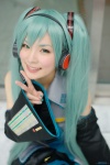 aqua_hair blouse cosplay detached_sleeves hatsune_miku headset maitako pleated_skirt skirt tie twintails vocaloid rating:Safe score:0 user:pixymisa