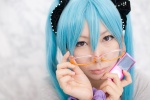 aoki aqua_hair cosplay glasses hatsune_miku headphones hoodie ipod looking_over_glasses sound_(vocaloid) twintails vocaloid rating:Safe score:0 user:pixymisa