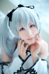 cosplay detached_sleeves halter_top hatsune_miku headset shuuto silver_hair skirt twintails vocaloid voice_(vocaloid) rating:Safe score:0 user:pixymisa