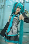 aqua_hair blouse cosplay detached_sleeves hatsune_miku headphones honma pleated_skirt skirt tie twintails vocaloid rating:Safe score:1 user:pixymisa