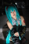 aqua_hair blouse cosplay detached_sleeves hatsune_miku headset narihara_riku pleated_skirt skirt thighhighs tie twintails vocaloid rating:Safe score:0 user:pixymisa