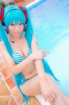 aqua_hair bikini cleavage cosplay hatsune_miku headset mashiro_yuki pool project_diva swimsuit twintails vocaloid wet rating:Safe score:0 user:nil!