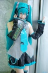 aqua_hair blouse cosplay detached_sleeves hatsune_miku headset hioron pleated_skirt skirt thighhighs tie twintails vocaloid zettai_ryouiki rating:Safe score:1 user:nil!