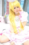 blonde_hair boots cosplay cure_rhythm dress hairbow kokoa minamino_kanade ponytail pretty_cure suite_precure rating:Safe score:0 user:nil!