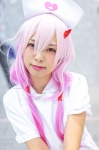 cosplay guilty_crown hiiragi_haruka nurse nurse_cap nurse_uniform pink_hair twintails yuzuriha_inori rating:Safe score:0 user:pixymisa