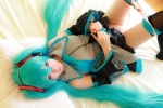 aqua_hair arai_yomi bed blouse cosplay detached_sleeves hatsune_miku headset panties pleated_skirt skirt skirt_lift thighhighs tie twintails vocaloid rating:Questionable score:5 user:nil!