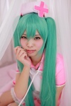 aqua_hair cosplay hatsune_miku hiiragi_haruka nurse nurse_cap nurse_uniform stethoscope thighhighs twintails vocaloid zettai_ryouiki rating:Safe score:0 user:pixymisa