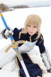 armor blonde_hair blouse braid cosplay fate/series fate/stay_night gauntlets kamui_arisa red_moon saber skirt sword rating:Safe score:0 user:nil!