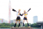 blonde_hair blouse blue_eyes cosplay crossplay detached_sleeves hairbow hair_clips headset kagamine_len kagamine_rin leggings mogeta scarf_tie shorts uri vocaloid rating:Safe score:1 user:pixymisa