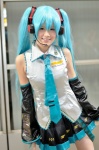 aqua_hair blouse cosplay detached_sleeves hatsune_miku headset pleated_skirt popuri skirt tie twintails vocaloid rating:Safe score:0 user:pixymisa