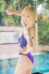 ahoge ass blonde_hair cosplay fate/series fate/stay_night king~earth~ mike one-piece_swimsuit ponytail pool saber swimsuit rating:Safe score:3 user:nil!