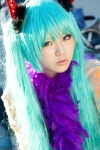 aqua_hair blouse boa cosplay devil_horns halloween hatsune_miku twintails umemaru vocaloid rating:Safe score:0 user:pixymisa